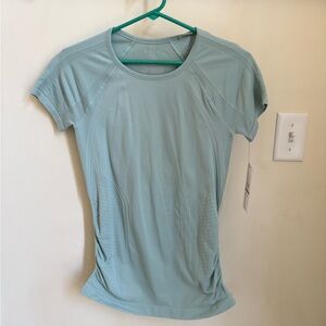 Gaiam light green shirt